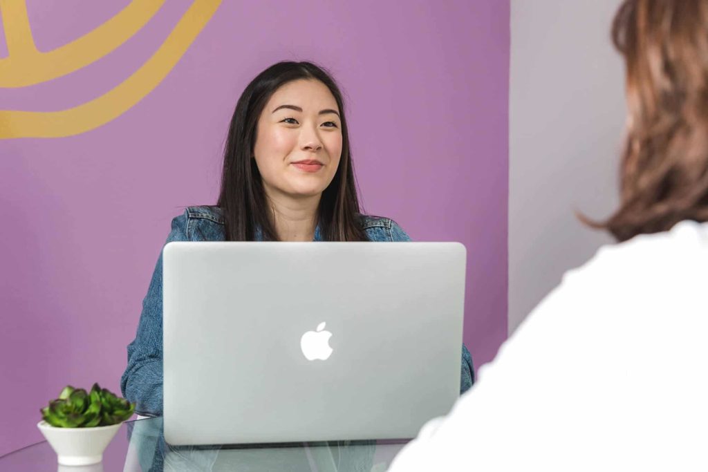 Woman on an Apple Laptop